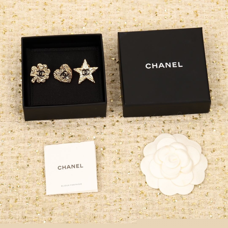 Ch*el brooches